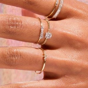 Stone and strand shield of strength ring